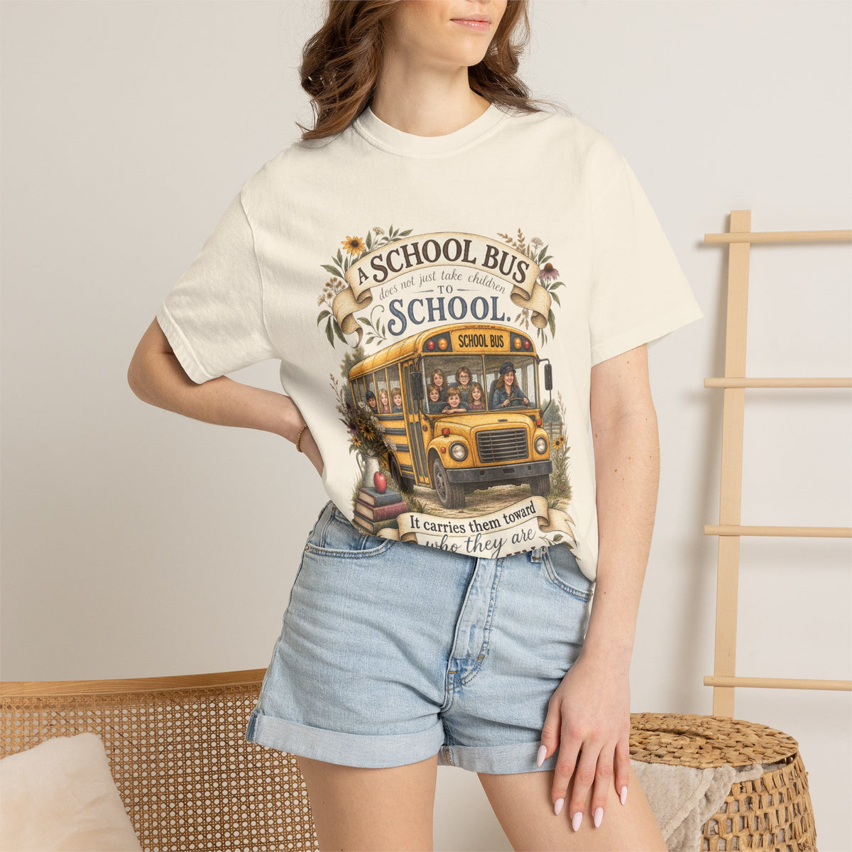 School Bus Teacher T‑Shirt – “A School Bus Is A School…It Carries Them Toward Where They Are Becoming”